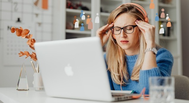blond woman having a headache 640x350