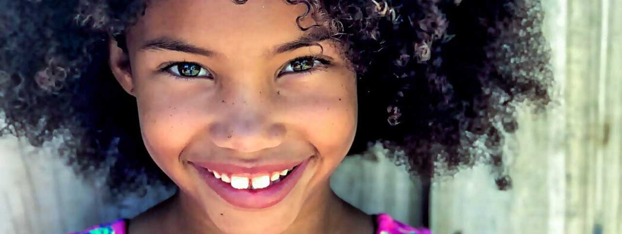 girl wearing pink white teal and blue crew neck cold 1068205 (1)