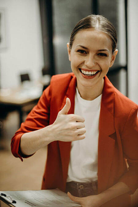woman thumbs up